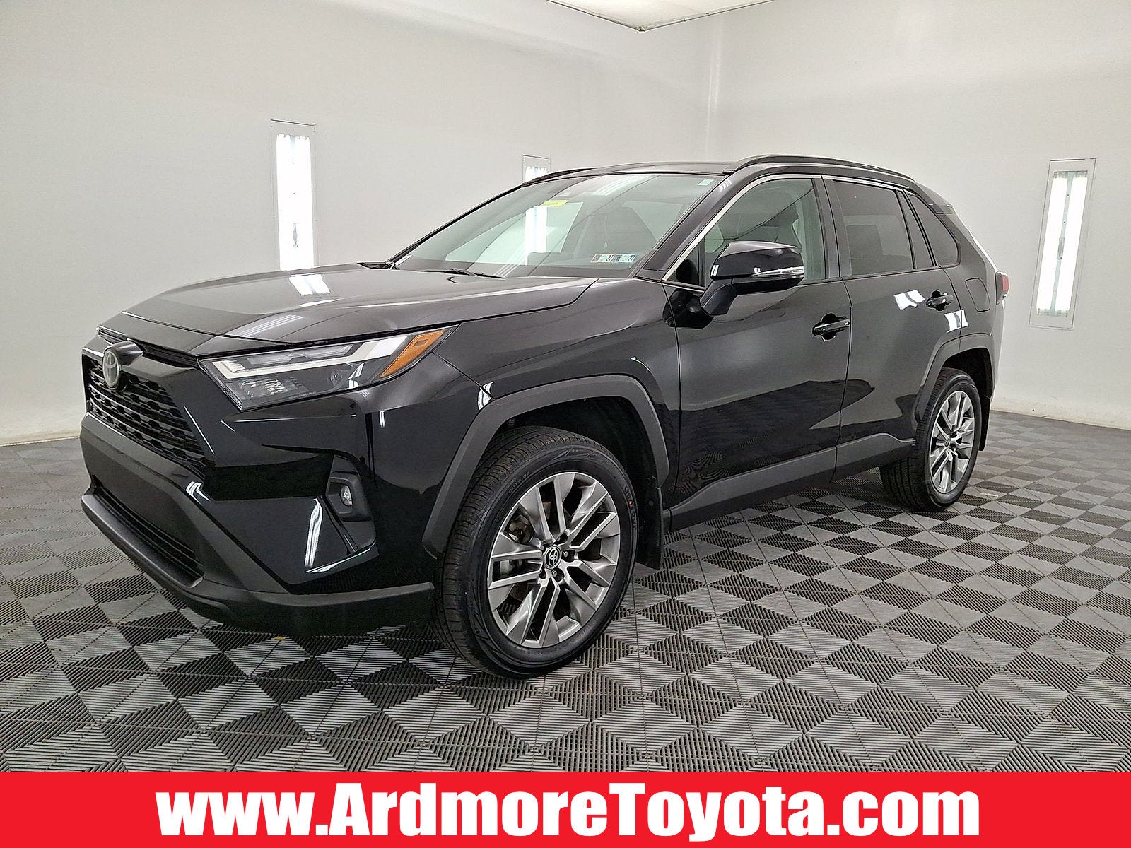 2023 Toyota RAV4 XLE Premium in Midnight Black Metallic — front three-quarter view