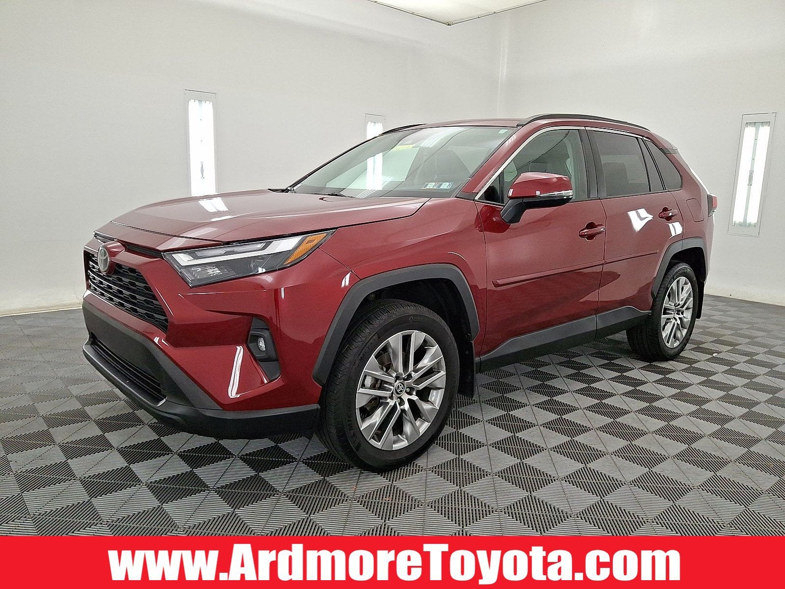 2023 Toyota RAV4 XLE Premium in Ruby Flare Pearl — front three-quarter view