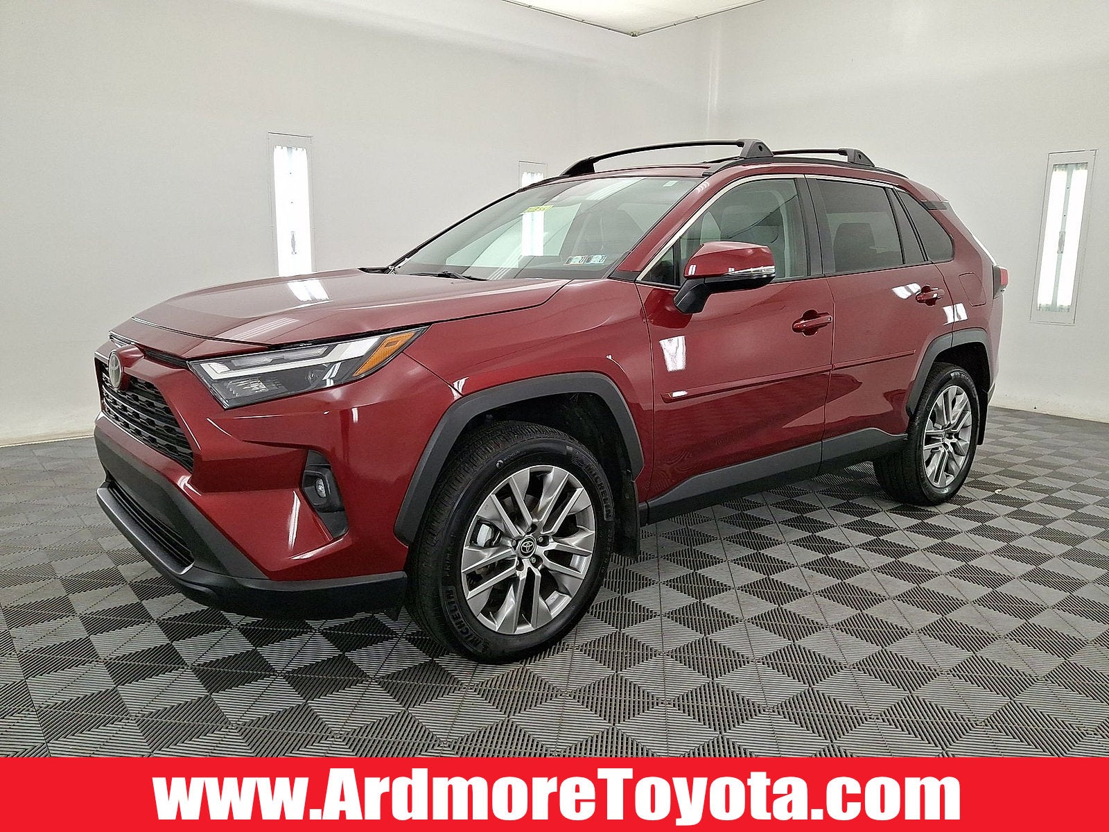 2023 Toyota RAV4 XLE Premium in Ruby Flare Pearl — front three-quarter view