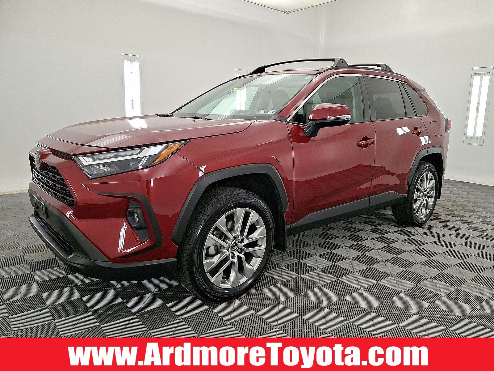 2024 Toyota RAV4 XLE Premium in Ruby Flare Pearl — front three-quarter view