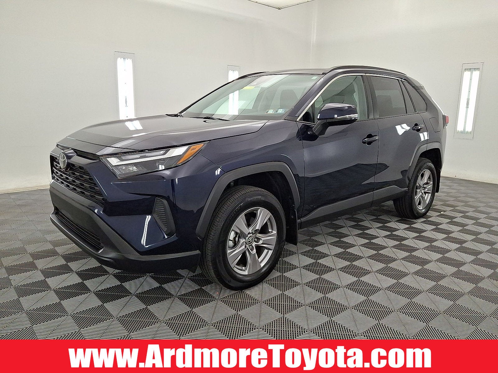 2024 Toyota RAV4 XLE in Blueprint — front three-quarter view