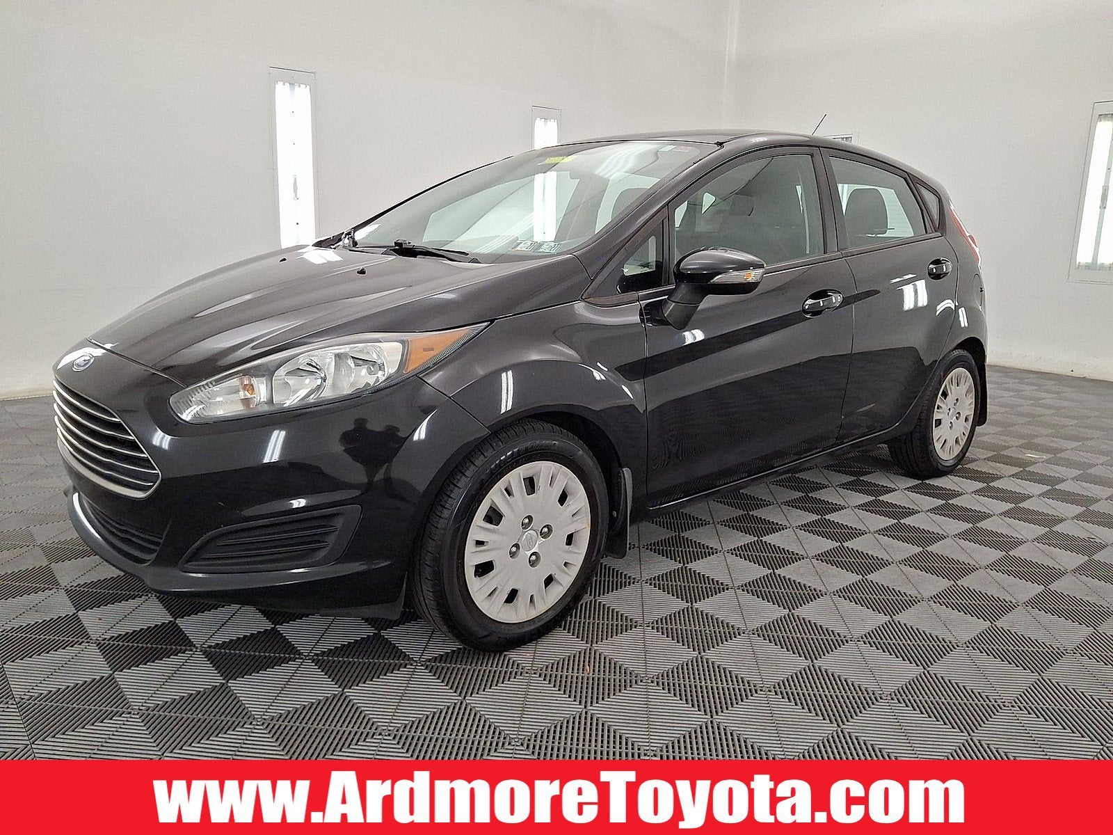 2015 Ford Fiesta SE in Tuxedo Black — front three-quarter view