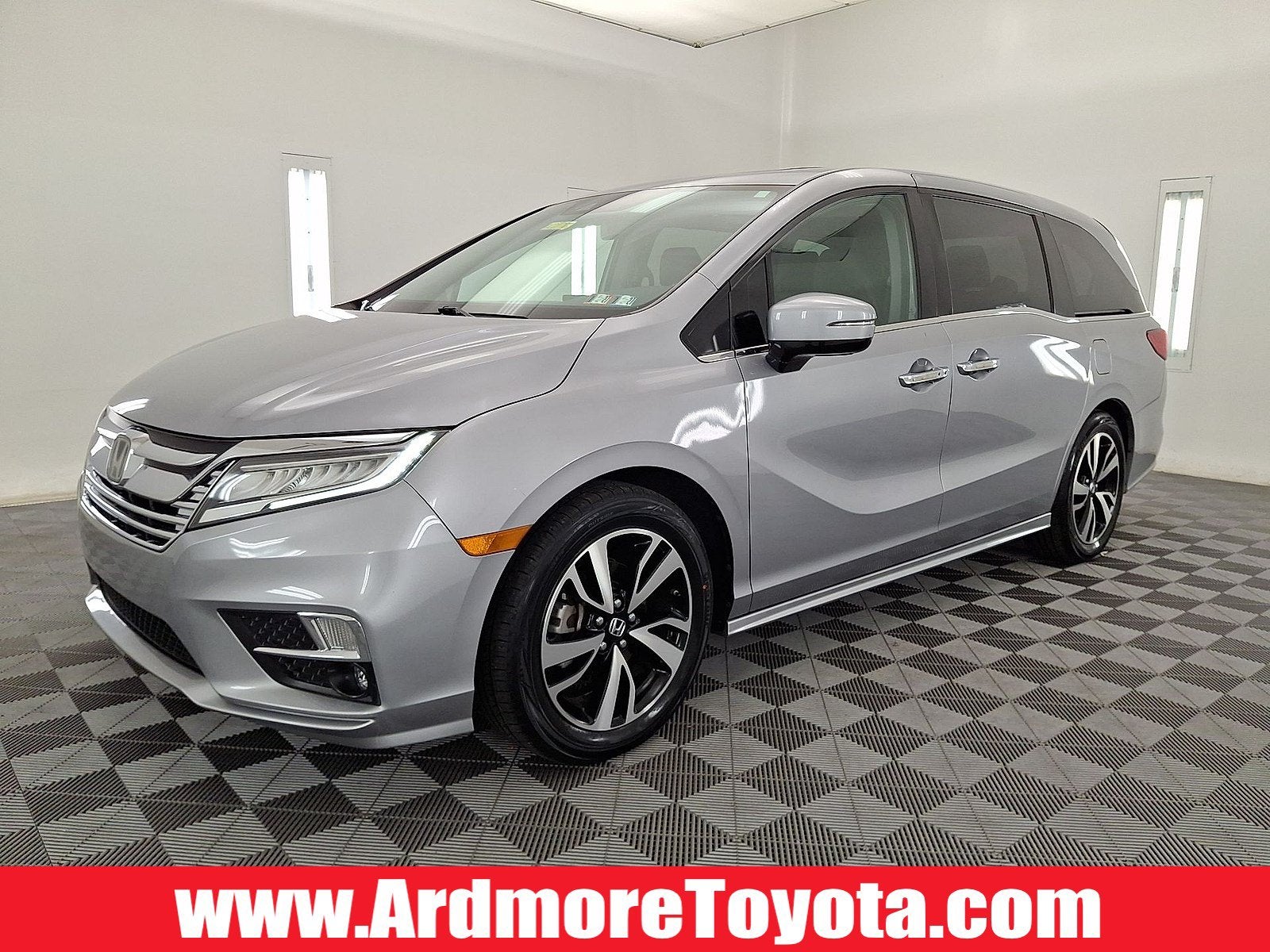 2018 Honda Odyssey Elite in Modern Steel Metallic — front three-quarter view