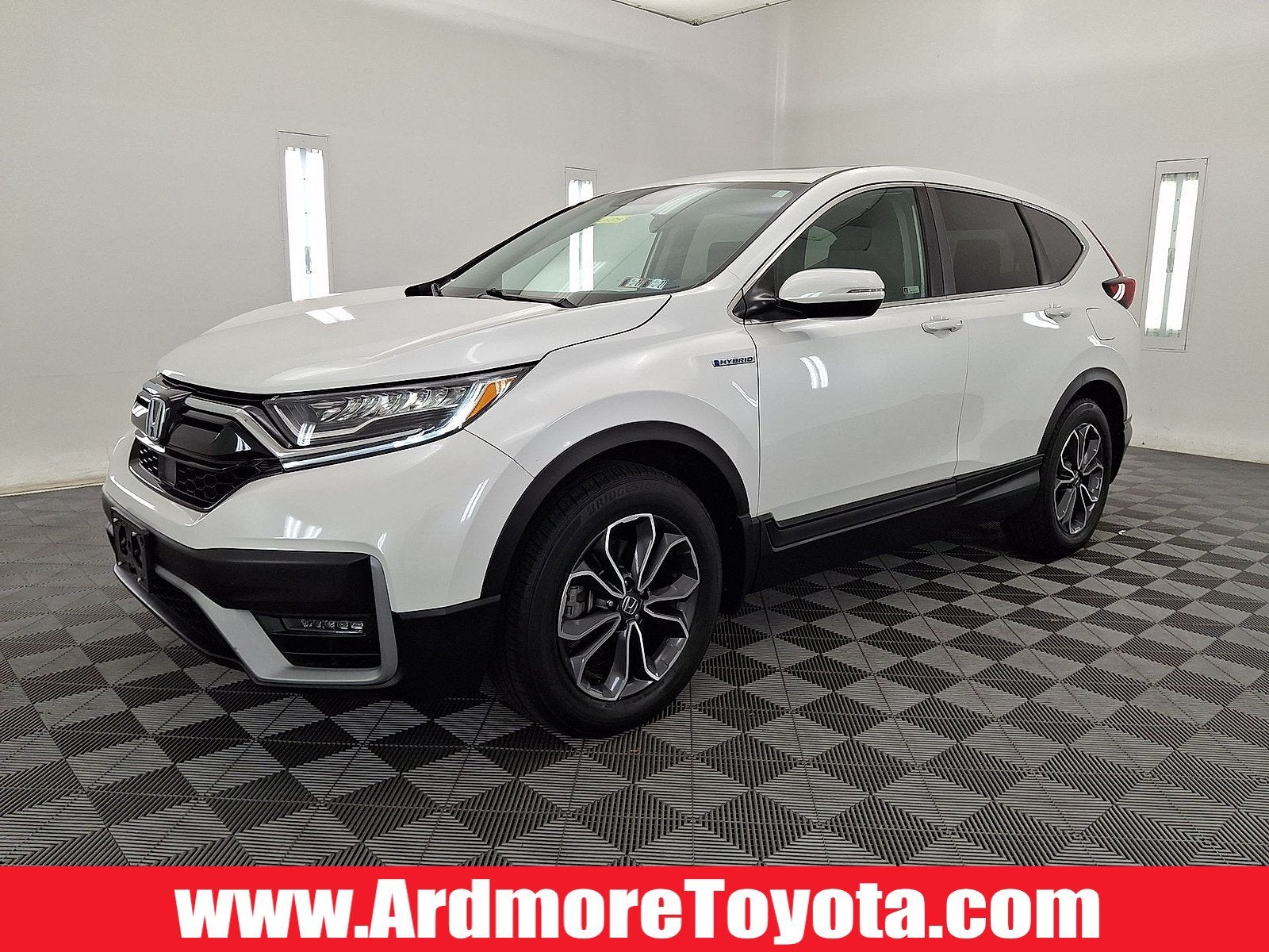 2020 Honda CR-V Hybrid EX in Platinum White Pearl — front three-quarter view