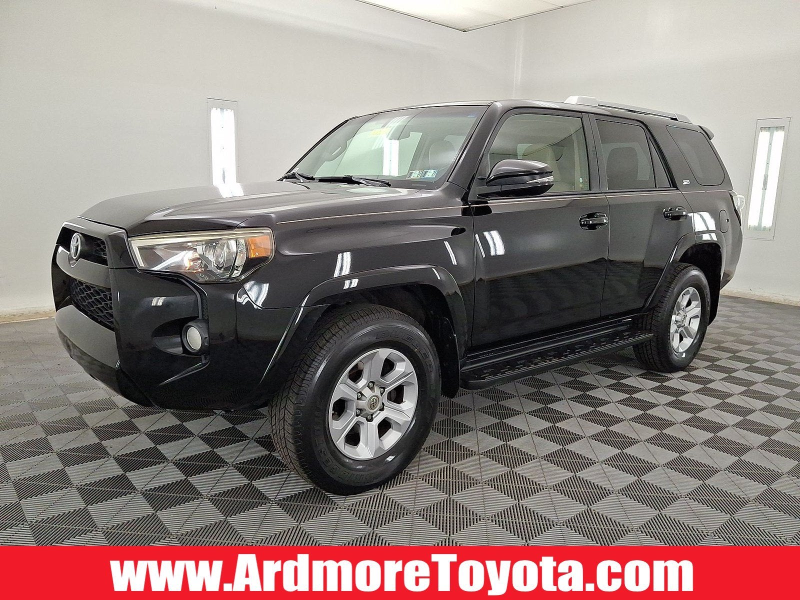 2014 Toyota 4Runner SR5 Premium in Black — front three-quarter view