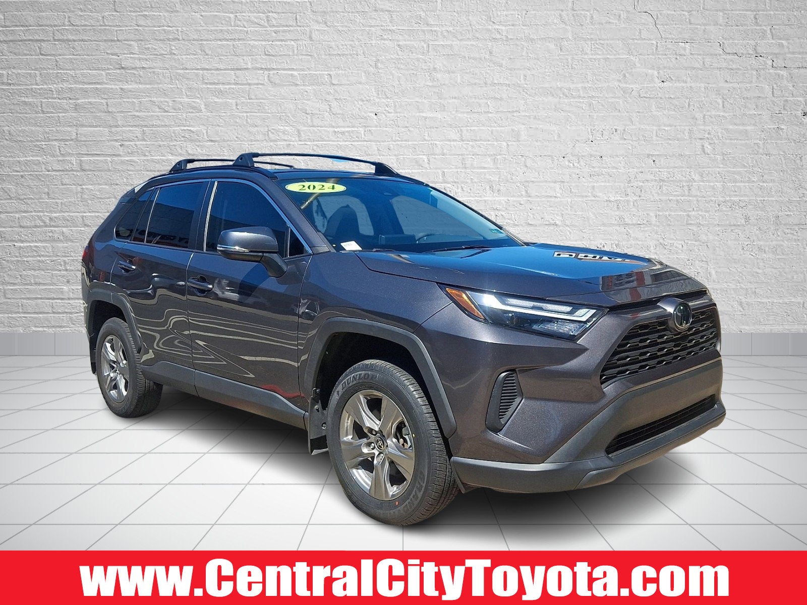 2024 Toyota RAV4 XLE in Magnetic Gray Metallic — front three-quarter view