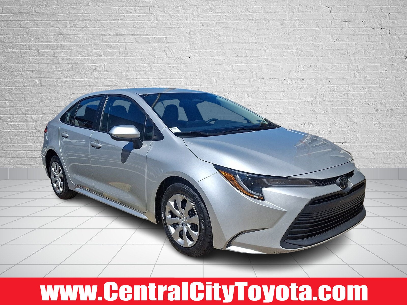 2023 Toyota Corolla LE in Classic Silver Metallic - 1F7 — front three-quarter view