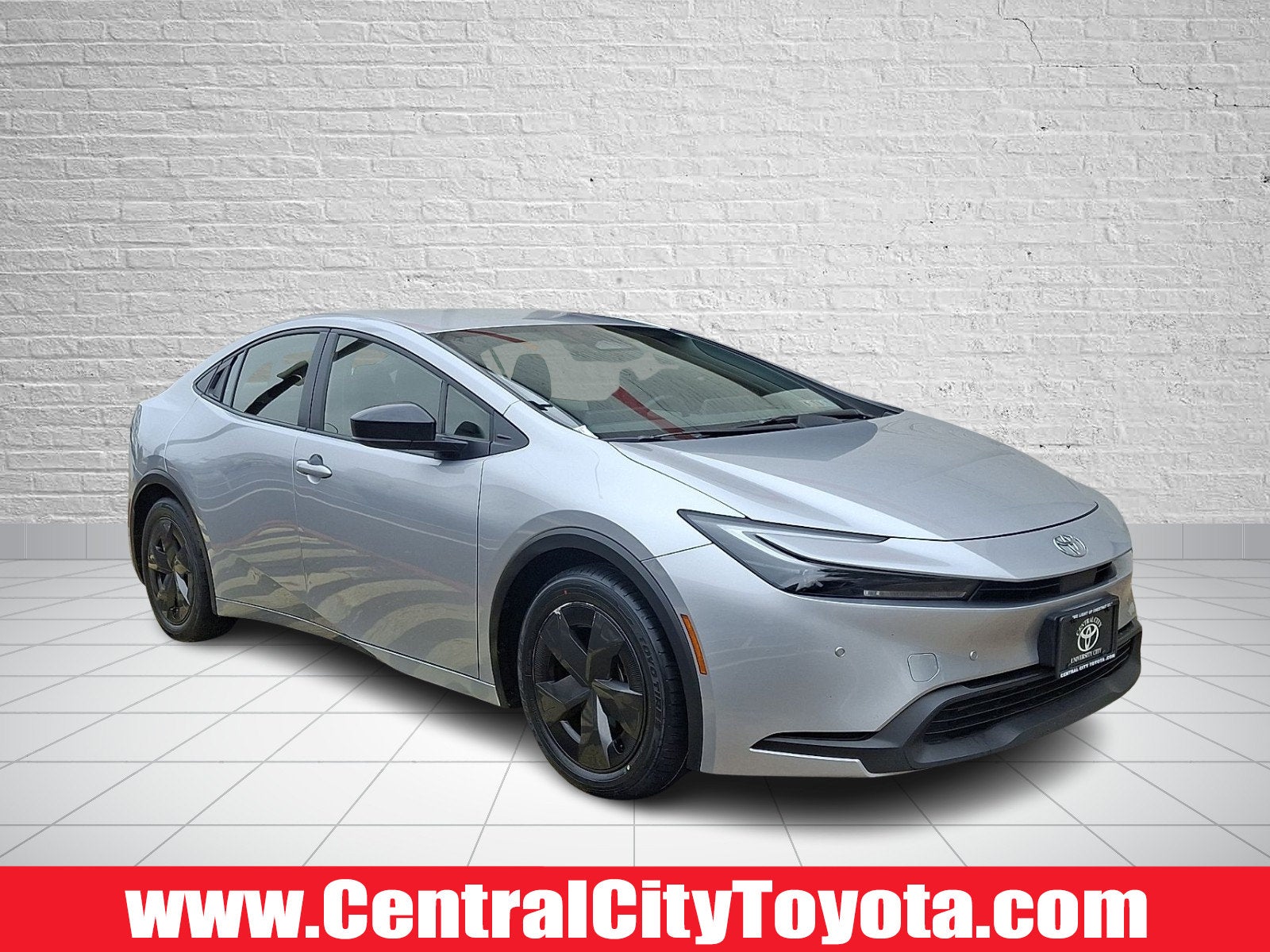 2024 Toyota Prius LE in Cutting Edge — front three-quarter view